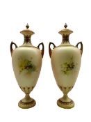 Pair of late Victorian Royal Worcester two handled baluster vases and covers painted with fruit