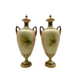 Pair of late Victorian Royal Worcester two handled baluster vases and covers painted with fruit
