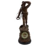 Bronzed figural spelter clock with French timepiece movement depicting a sailor in a boat labelled '