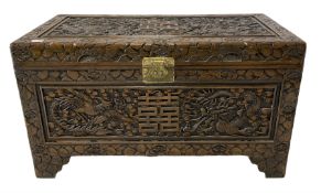 Oriental carved camphor wood blanket box with dragon