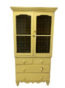 Yellow painted kitchen cabinet
