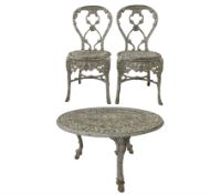 Pair of aluminium garden chairs with all over floral design