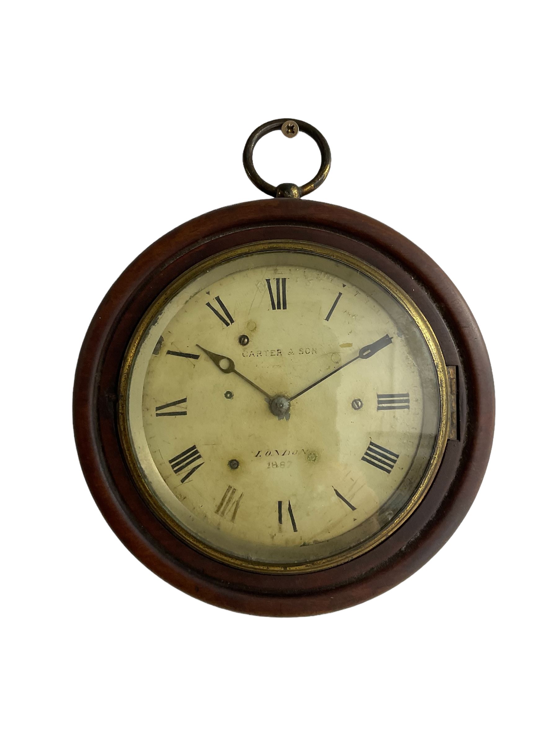 A late 19th century wall clock with a French timepiece movement mounted within a circular 7”