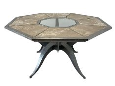 Contemporary steel dining table in octagonal form