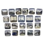 Twenty-one Royal Copenhagen square porcelain pin dishes including scenes of 'Skoleskibet'