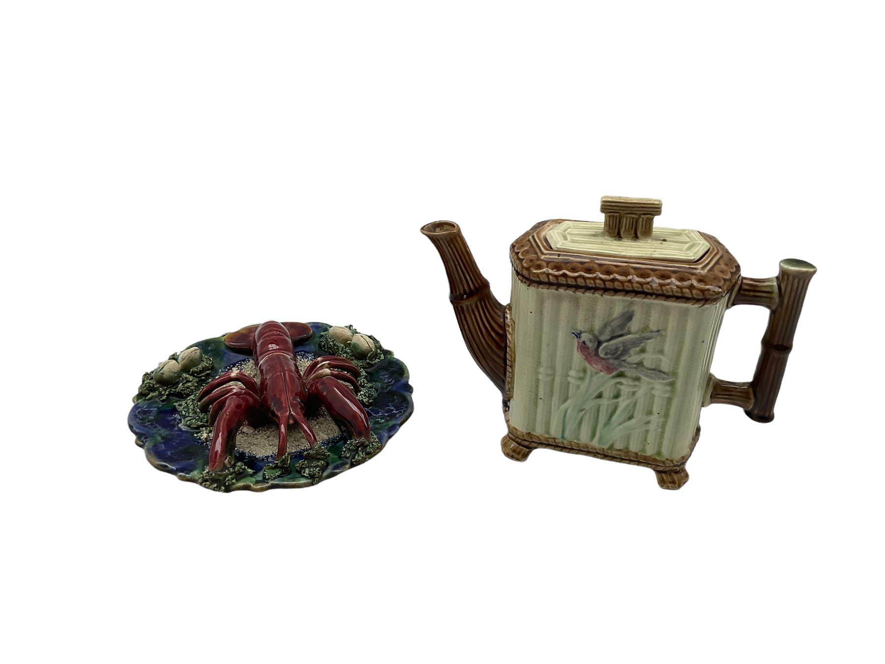 Palissy style majolica lobster wall plaque together with majolica teapot of bamboo form with bird de