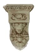 Plaster corbel with classical mask