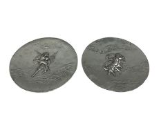 Pair of French pewter Etain Garanti plates with relief showing Dawn and Dusk