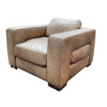 Armchair upholstered in leather