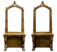 Pair Gothic style oak console table with mirror