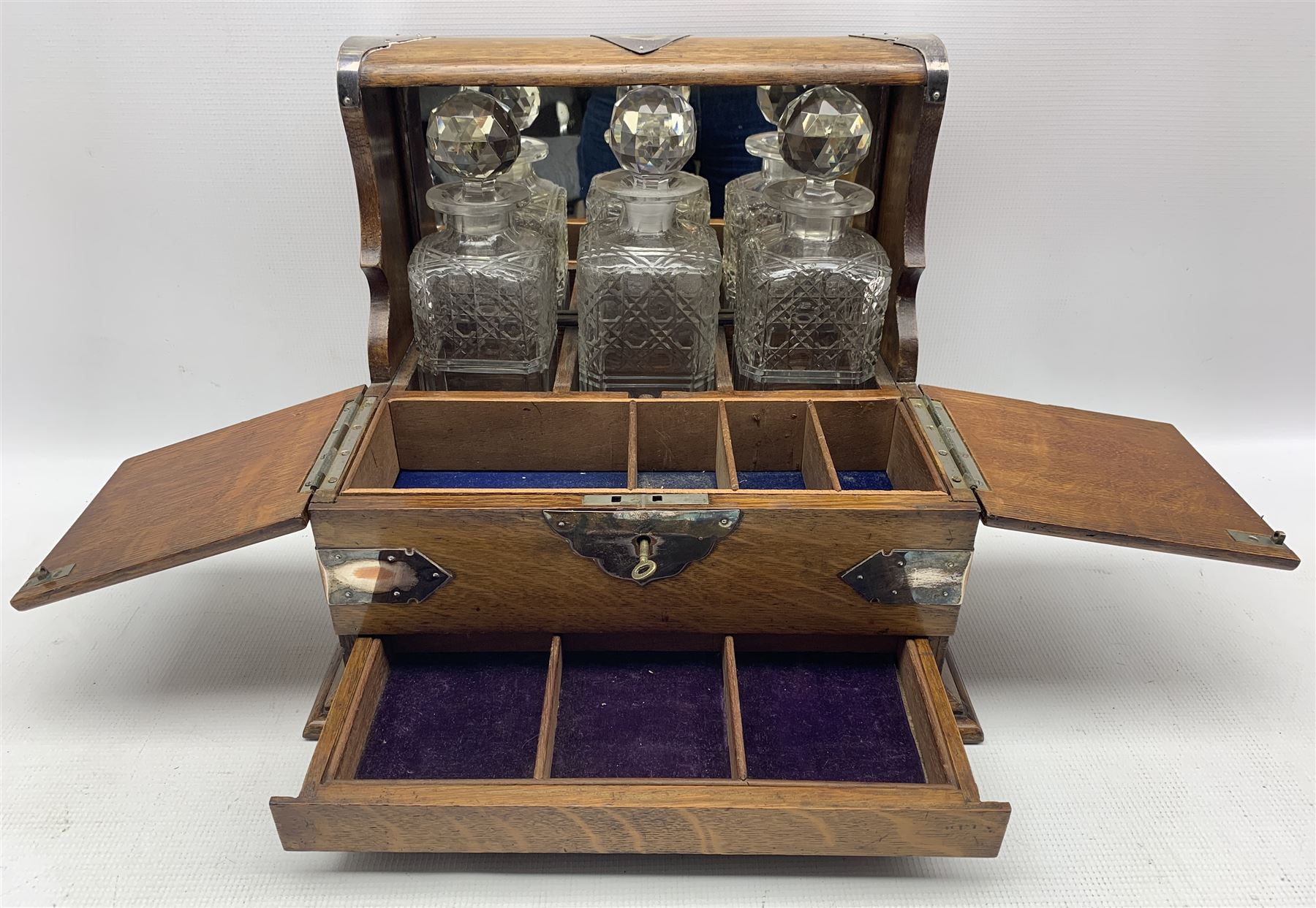 Edwardian oak three-bottle tantalus with silver-plated strapwork mounts - Image 2 of 7