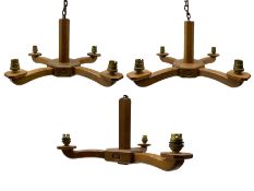 Acornman - pair of four-branch oak ceiling lights and another with three-branches