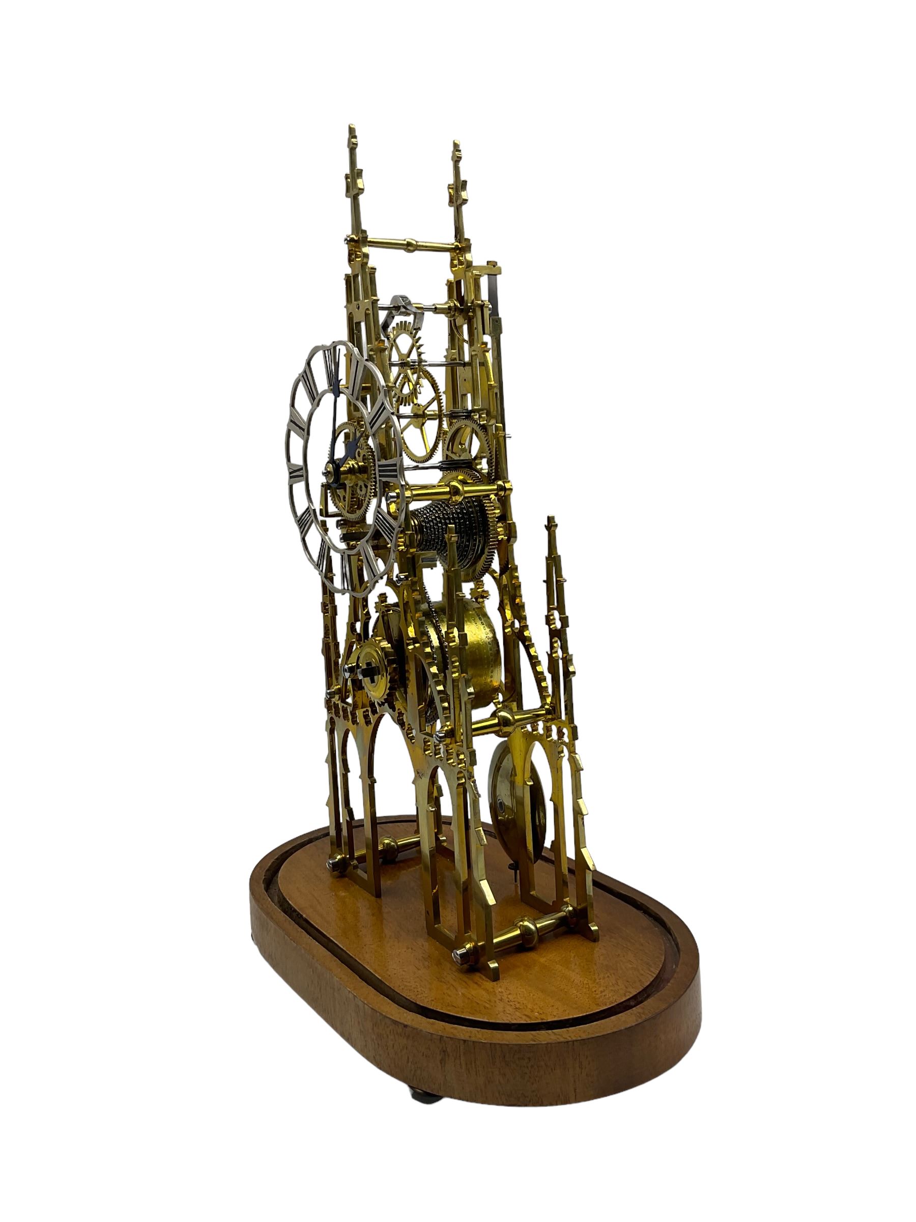 A 20th century seven pillar single train fusee skeleton clock with fretted triple spire movement pla - Image 2 of 3