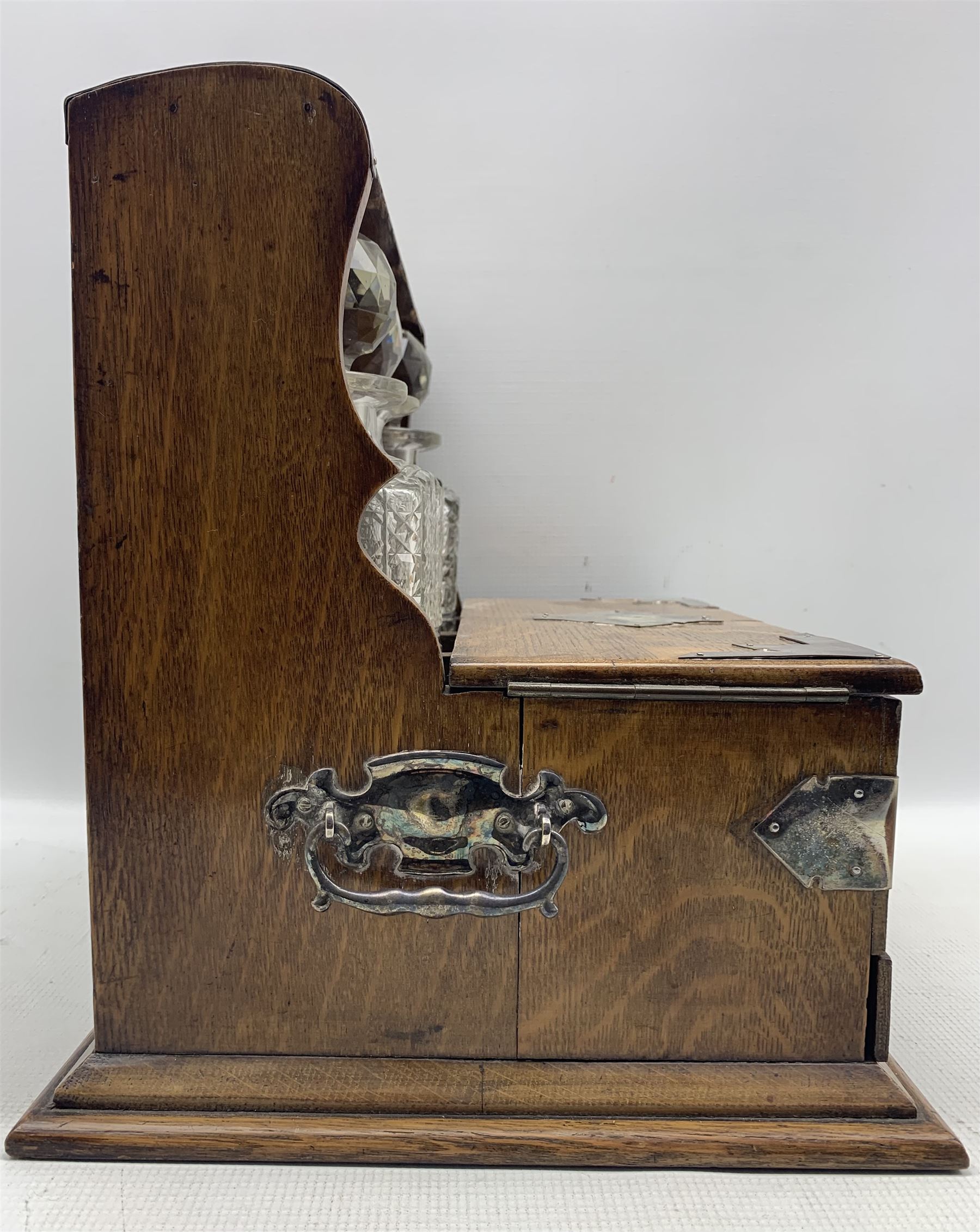 Edwardian oak three-bottle tantalus with silver-plated strapwork mounts - Image 4 of 7