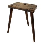 Early 19th century three-legged milking stool