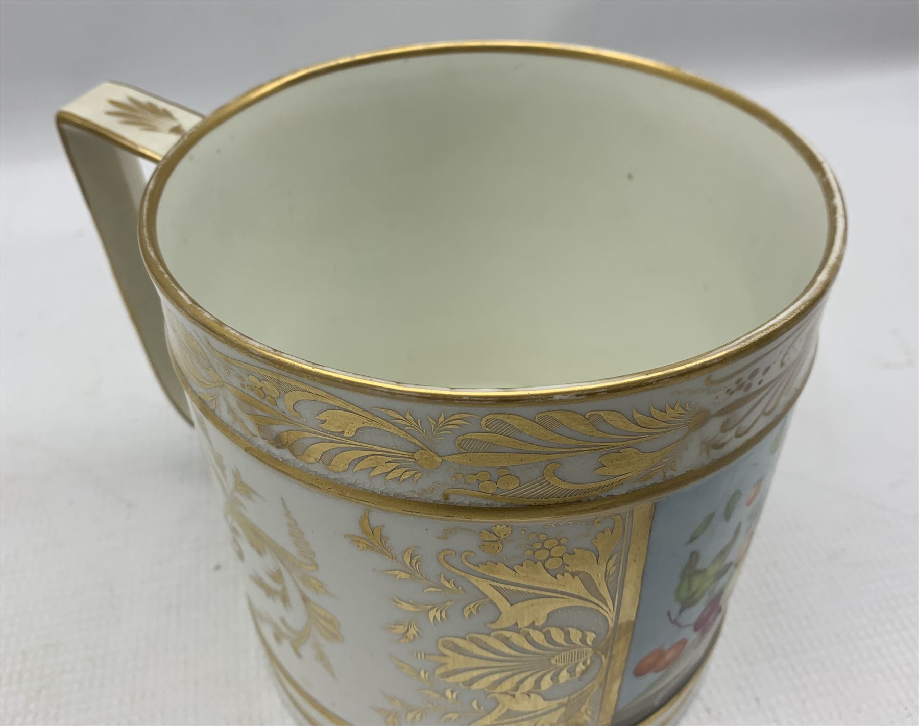 Early 19th century Derby porter mug painted with a panel of fruit with gilded scrolls and foliage an - Image 3 of 6