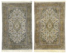 Pair Persian Kashan ivory ground rugs
