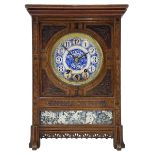 Carved oak cased 8-day striking and chiming mantle clock in the style of William Morris c1880
