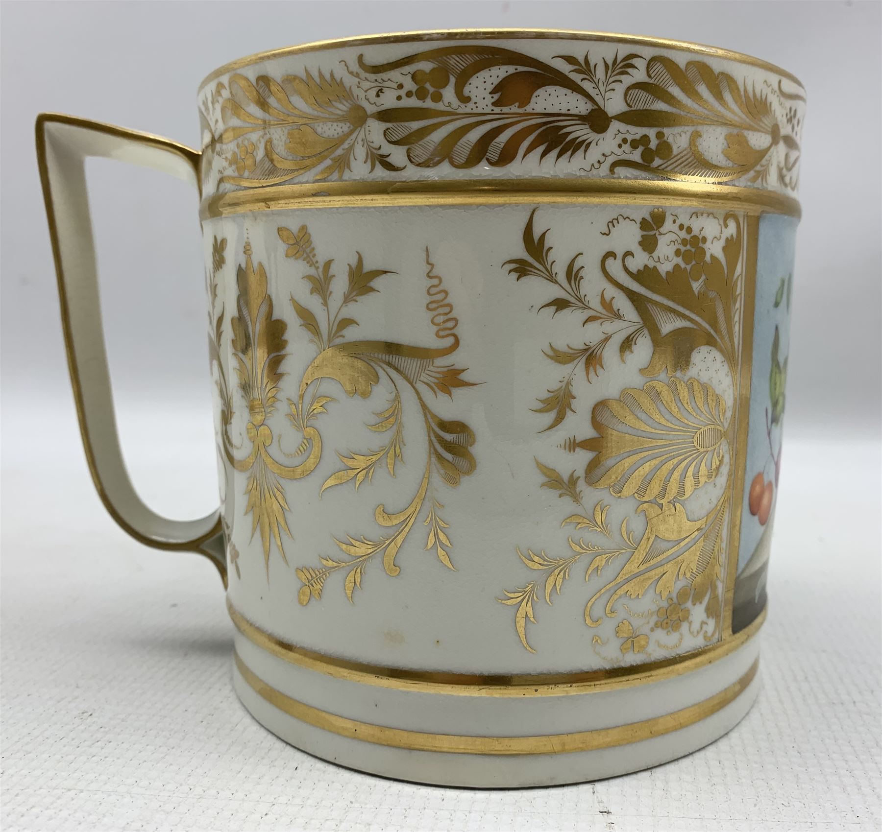 Early 19th century Derby porter mug painted with a panel of fruit with gilded scrolls and foliage an - Image 2 of 6