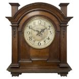 Large and imposing wall mounted clock in an oak case with a single train fusee movement