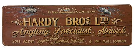 Hand painted shop sign advertising Hardy Bros Ltd By Royal Appointment to H.M. The King