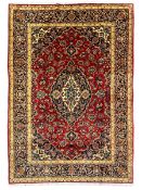 Persian Kashan red ground rug