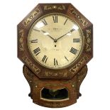 Single Fusee 8-day wall clock in a Mahogany case with a 17� Hexagonal wooden dial surround retailed