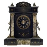 A mid-19th century mantle clock in a Belgium slate case with a French striking movement