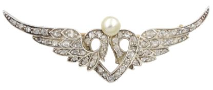 Early 20th century gold and silver winged heart brooch