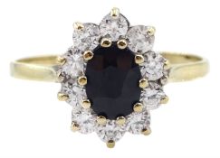 9ct gold oval sapphire and cubic zirconia cluster ring