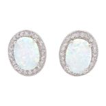 Pair of silver opal and cubic zirconia cluster stud earrings