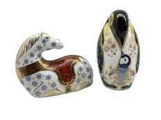 Two Royal Crown Derby paperweights comprising Penguin & Chick dated 1998 and Chinese Horse