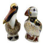 Two Royal Crown Derby paperweights comprising 'Brown Pelican' dated 1998 and Puffin