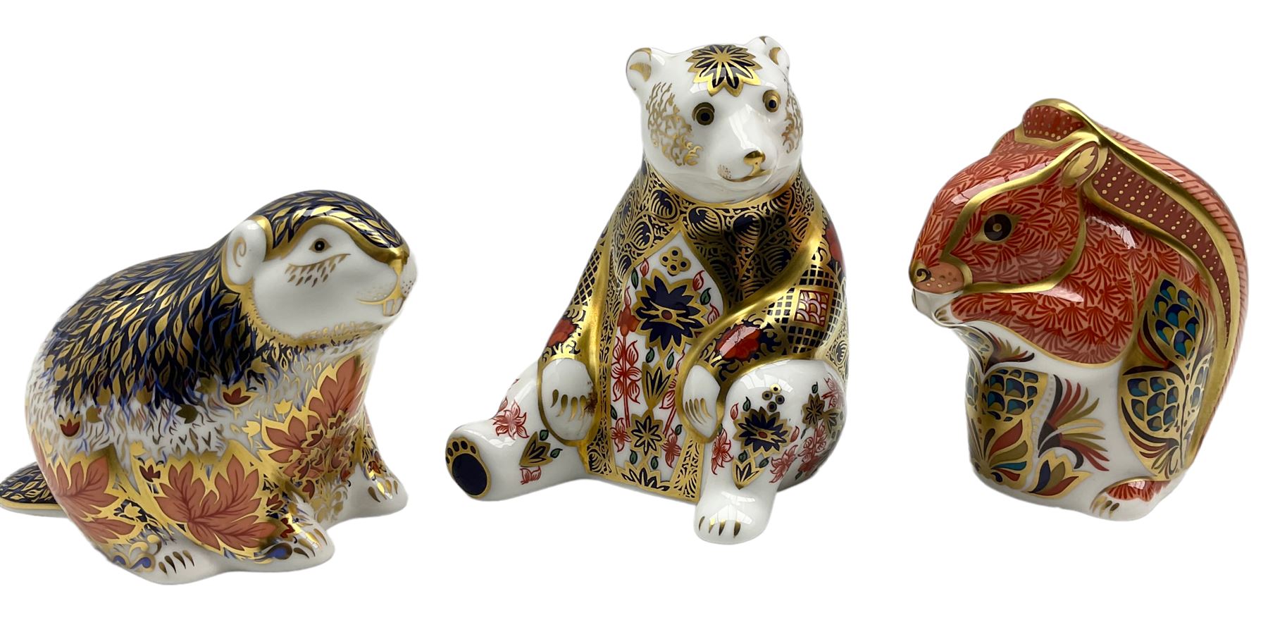 Three Royal Crown Derby paperweights comprising 'Riverbank Beaver' Limited Edition of 1500