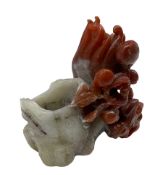 Chinese red and white Carnelian agate vase pierced and carved with a fruiting tree with peaches on a