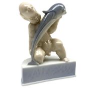 Royal Copenhagen model of cherub holding dolphin No.2228 H14cm