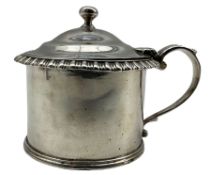 George IV silver circular lidded mustard pot with gadrooned edge and blue glass liner