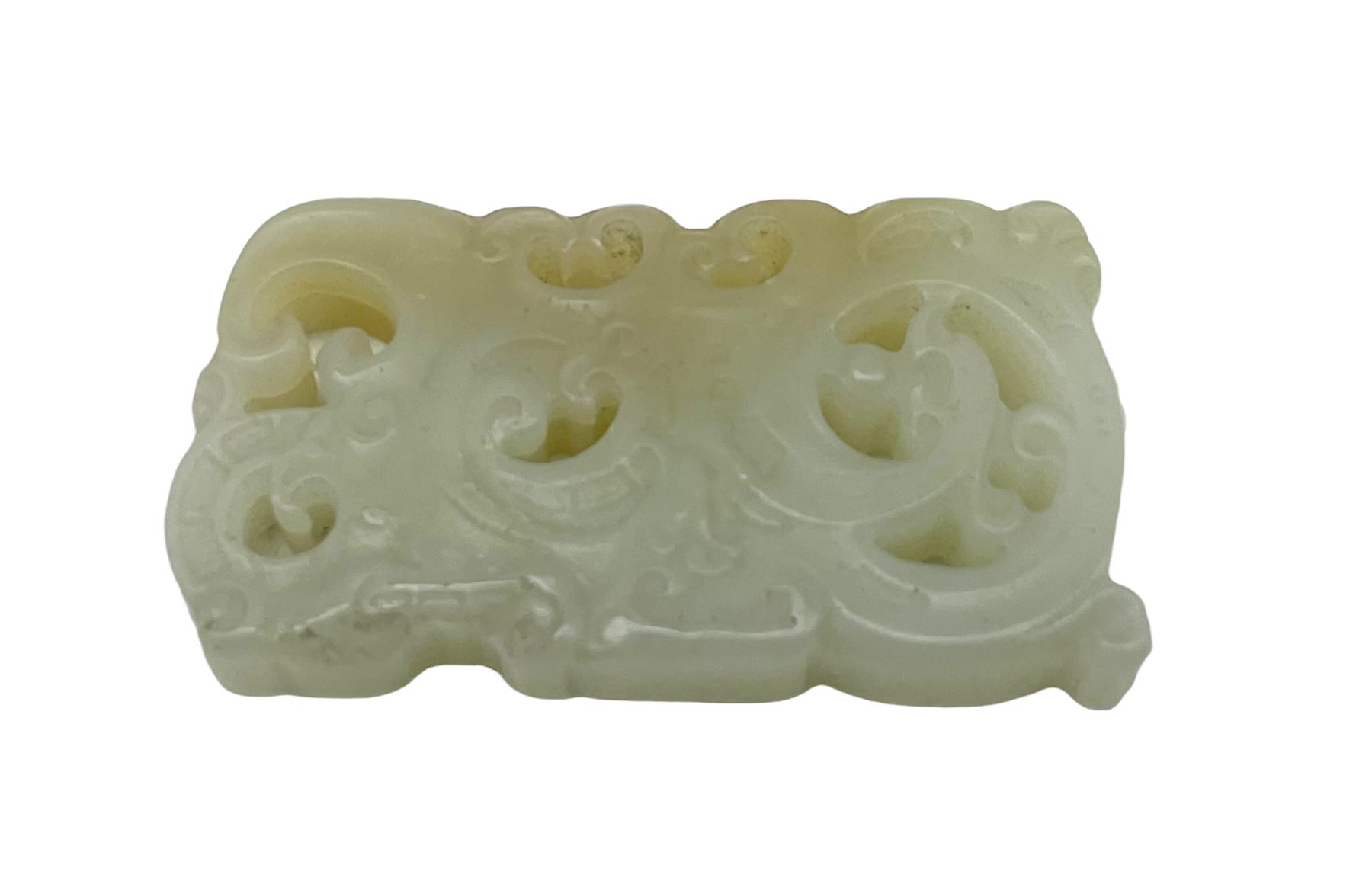 Chinese jade rectangular plaque with carved and pierced decoration 4.5cm x 2.5cm