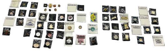 Collection of American enamel racecourse badges including Hollywood Park