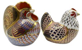 Two Royal Crown Derby paperweights comprising a Cockerel and Hen dated 1994 and 1995 (2)