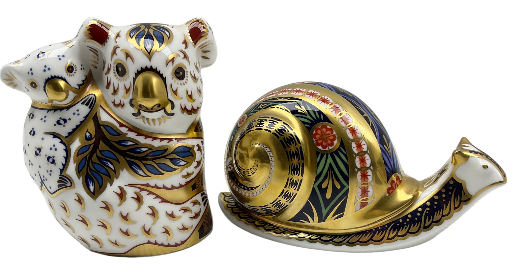 Two Royal Crown Derby paperweights comprising The Australian Collection 'Koala and Baby' designed by