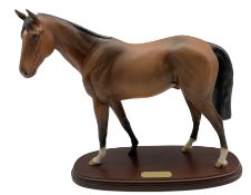 Royal Doulton racehorse 'Troy' on wooden plinth