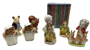 Collection of nine Beswick Beatrix Potter figures all with gold back stamps including Mrs Tiggy-Wink