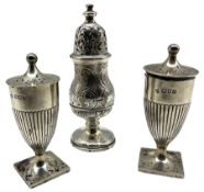 Pair of late Victorian silver pepperettes of urn form London 1896