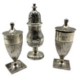 Pair of late Victorian silver pepperettes of urn form London 1896