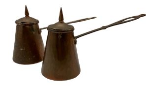 Pair of early 20th century copper chocolate pots with spear lifts and flattened pierced handles 16cm