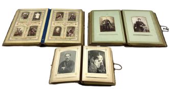 Victorian leather photograph album with lithographed pages and contents of portrait photographs and