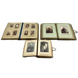 Victorian leather photograph album with lithographed pages and contents of portrait photographs and