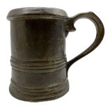 18th century bell metal mug with ribbed body and loop handle H14cm