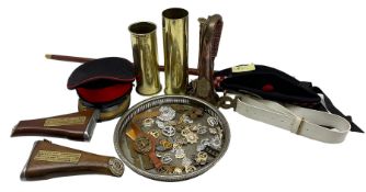 Collection of militaria including two Glengarries